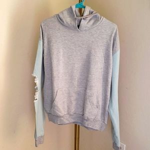 Distressed denim sweat shirt
